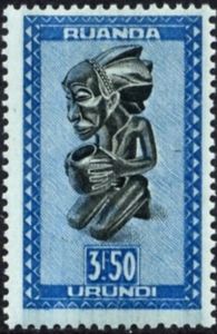 "Buangakokoma" (Kneeling female figure holding a cup)