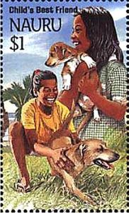 Children playing with Dogs