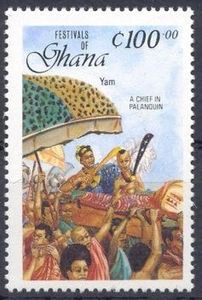 Yam Chief held aloft in a palanquin