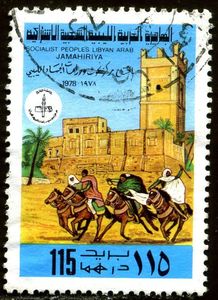 Horsemen in front of a fort