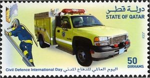 Fireman on ladder & firetruck