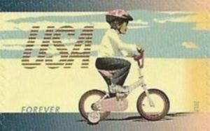 Child on Bicycle with Training Wheels