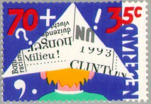 Child in Newspaper Hat