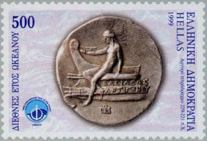 Apollo seated at a ship's bow