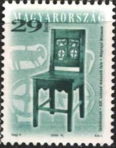 19th century chair with animal designs