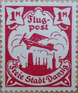 Airplane flying over the skyline of Danzig