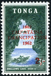 Aircraft flying above canoeist at Swallows' Cave, Vava'u