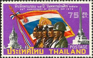 Flag, soldier and civilians