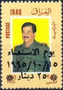 President Saddam Hussein with arab inscription