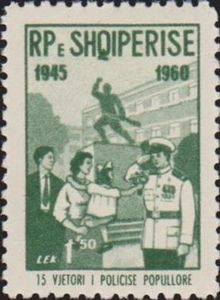 Liberation monument, Tirana, family and policeman