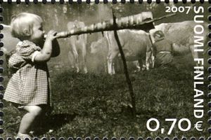 Herding girl blowing birch bark horn