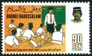 Teacher at Blackboard