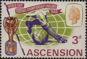 Footballer's legs, ball and Jules Rimet Cup