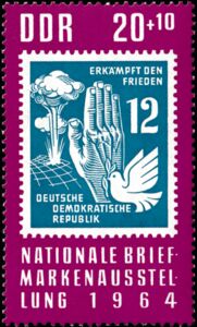 Stamp from 1950: Nuclear Bomb, Hand, and Peace Dove
