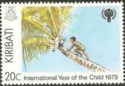 Boy Climbing Palm Tree