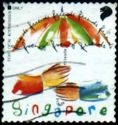 Greetings Stamps- Hands holding umbrella