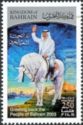 King Hamad bin Isa al-Khalifa, waving on a horse