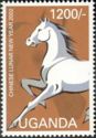 White horse facing left
