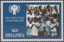 Malawi children and IYC emblem