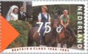 Queen Beatrix and Prince Claus on horseback