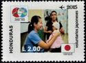 Japanese Volunteer with Baby, Emblem and Flag of Japan