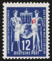 Brandenburg Gate, Berlin; Globe between postwoman and postma