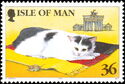 Cat on rug in German colours, Mouse and Brandenburg Gate