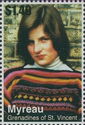 Diana as young girl in red, orange and black sweater