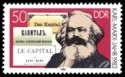 Marx with German, Russian & French versions of "Das Kapital"