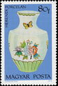 Vase with flowers and butterflies