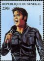 Elvis in Frontal View Singing to Handheld Microphone