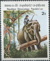 Asian Elephant (Elephas maximus) carrying log