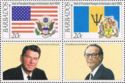 Pair, Barbados' and US' flags and arms