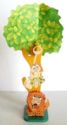 Tree with jungle man and lion