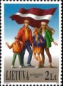 Family and Latvian Flag