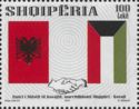 Handshake, flags of Albania and Kuwait