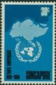 U.N. emblem and outline of Singapore