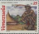 Ye'kuana man seated on post