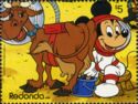Mickey is milking a Cow on the Moon