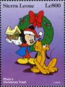 Pluto's Christmas Treat - Mickey and Pluto with a cake
