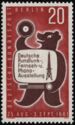 Bear with TV screen and record (exhibition poster)