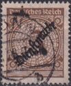 Official Stamp with black snake-shaped overprint