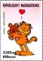 Garfield holding teddy bear