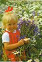 Child with summer flowers