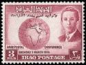King Faisal II and globe