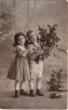 Two kids with flowers