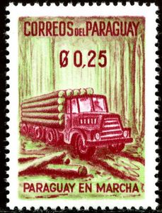 ‭Truck carrying logs