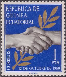 Clasped hands and laurel