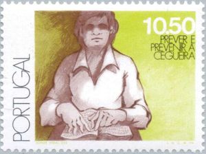 Blind woman reading Braille