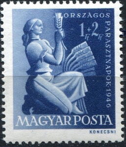 Woman with ear of wheat